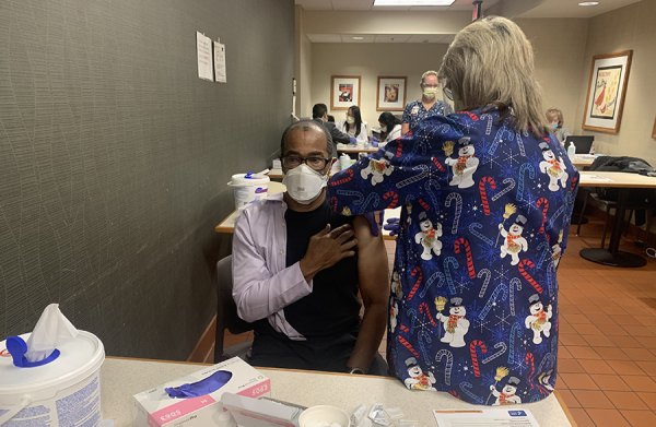 Adventist Chief of Staff Dr. Willie Ewing, a Lemoore-based physician, gets one of the first doses of the COVID-19 vaccine on Monday.
